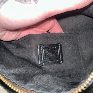 Chic Black Handbag with Gold Accents